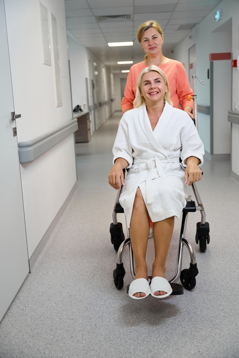 Concierge Nurse Nurse with young woman in wheelchair